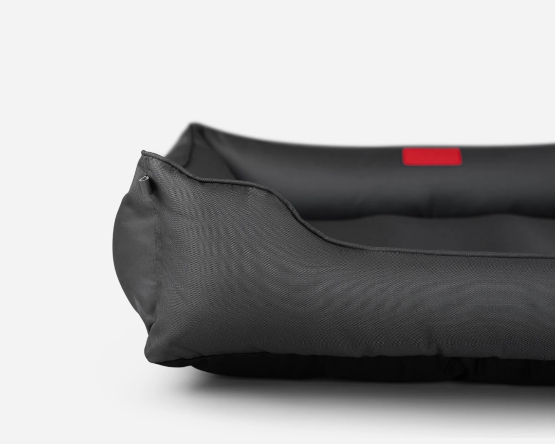 Side detail of the black Waterproof Sleeper Dog Bed