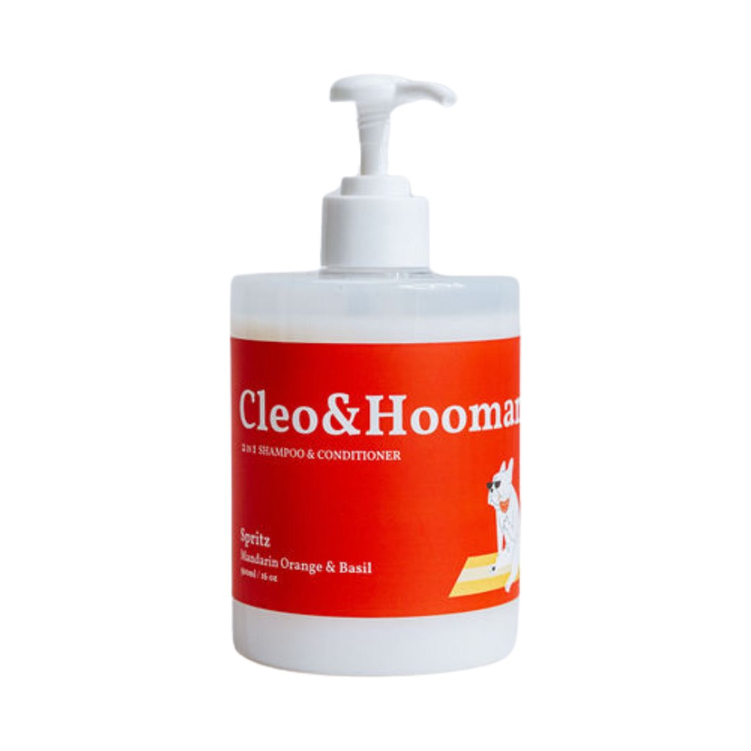 Bottle of Cleo & Hooman shampoo and conditioner with a pump on a white background