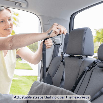 Adjustable straps fitting over vehicle headrests