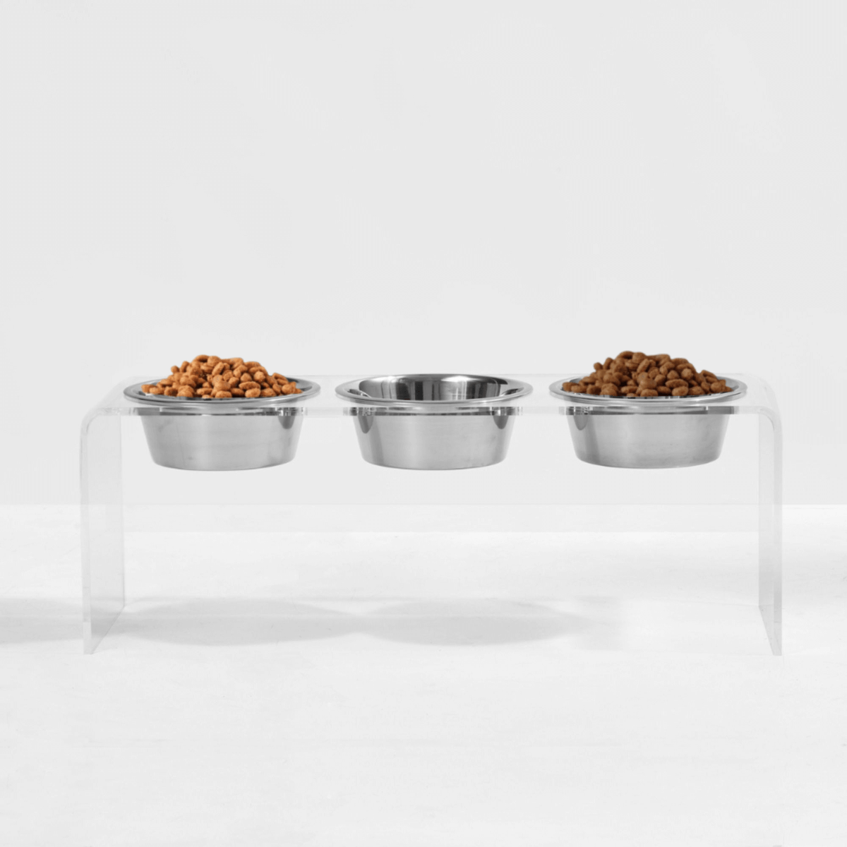 Tall clear triple feeder with silver bowls