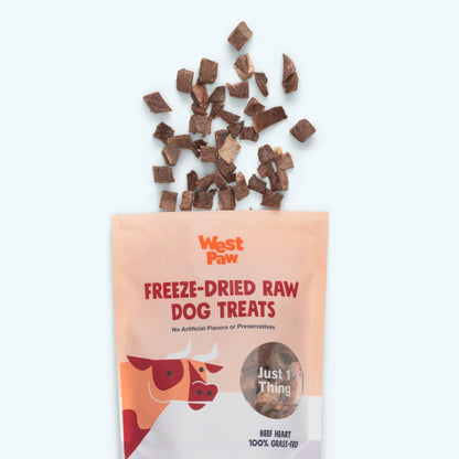 Freeze-dried beef heart treat pieces above the open West Paw package.