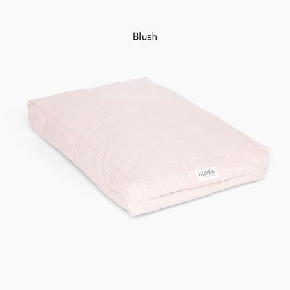 Hiddin Small Clear Pet Crate with blush cushion lifestyle view