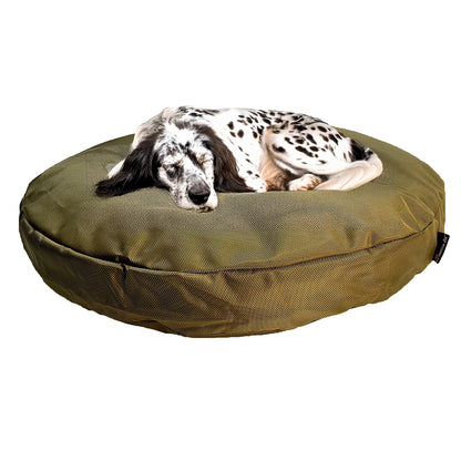 Dog resting on an olive Round Armor Dog Bed