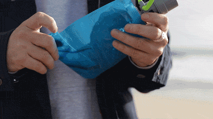 Vapur EZ Lick portable dog water bottle folded for compact storage