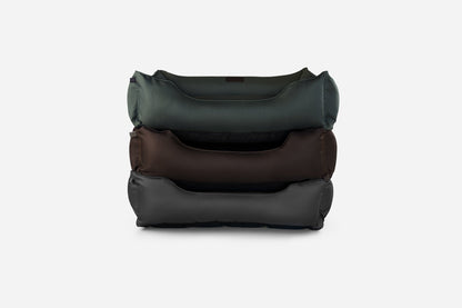 Waterproof Sleeper Dog Beds stacked in green, brown and black