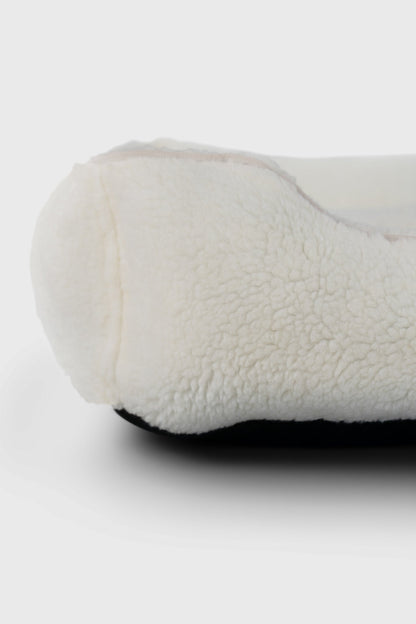 Furry Sleeper Dog Bed - Beige in use