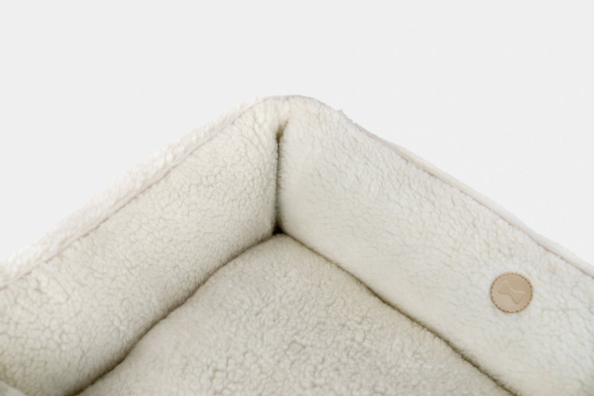 Furry Sleeper Dog Bed - Beige in use