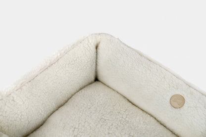 Furry Sleeper Dog Bed - Beige in use