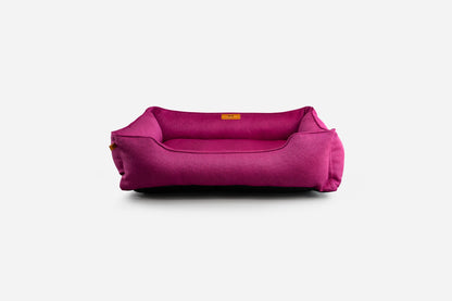 Cotton Sleeper Dog Bed - Berry Pink in use
