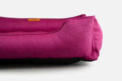 Cotton Sleeper Dog Bed - Berry Pink in use