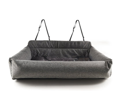 Performance tweed car bed secured with headrest straps