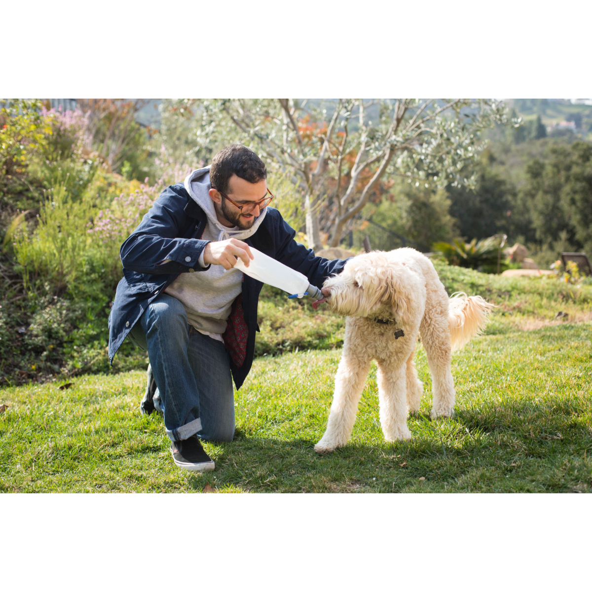 Vapur EZ Lick portable dog water bottle in use