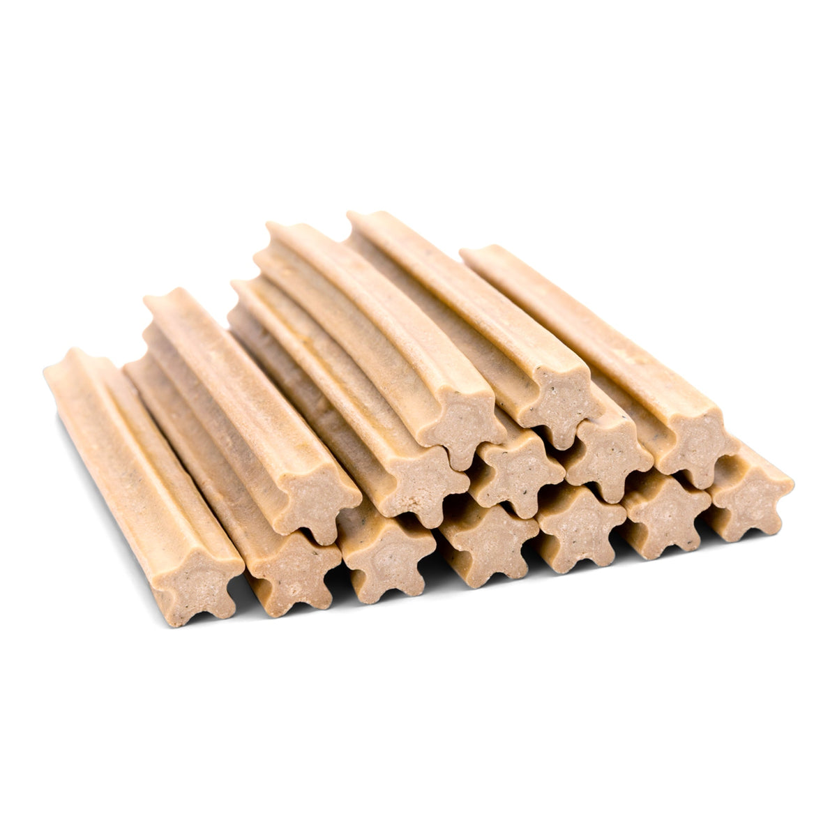 Stack of small tan dental sticks showing their ridged, star-shaped profile.