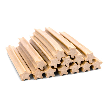 Stack of small tan dental sticks showing their ridged, star-shaped profile.