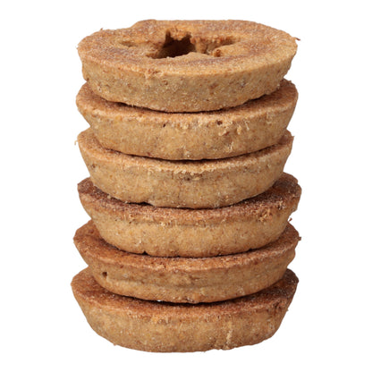 Stack of round Toppl Treats showing their textured edges.