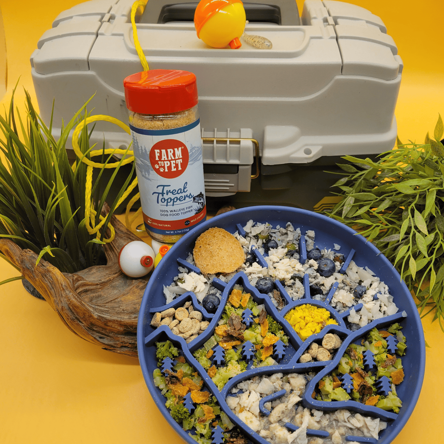 Farm To Pet Fish Treat Topper with tackle box display