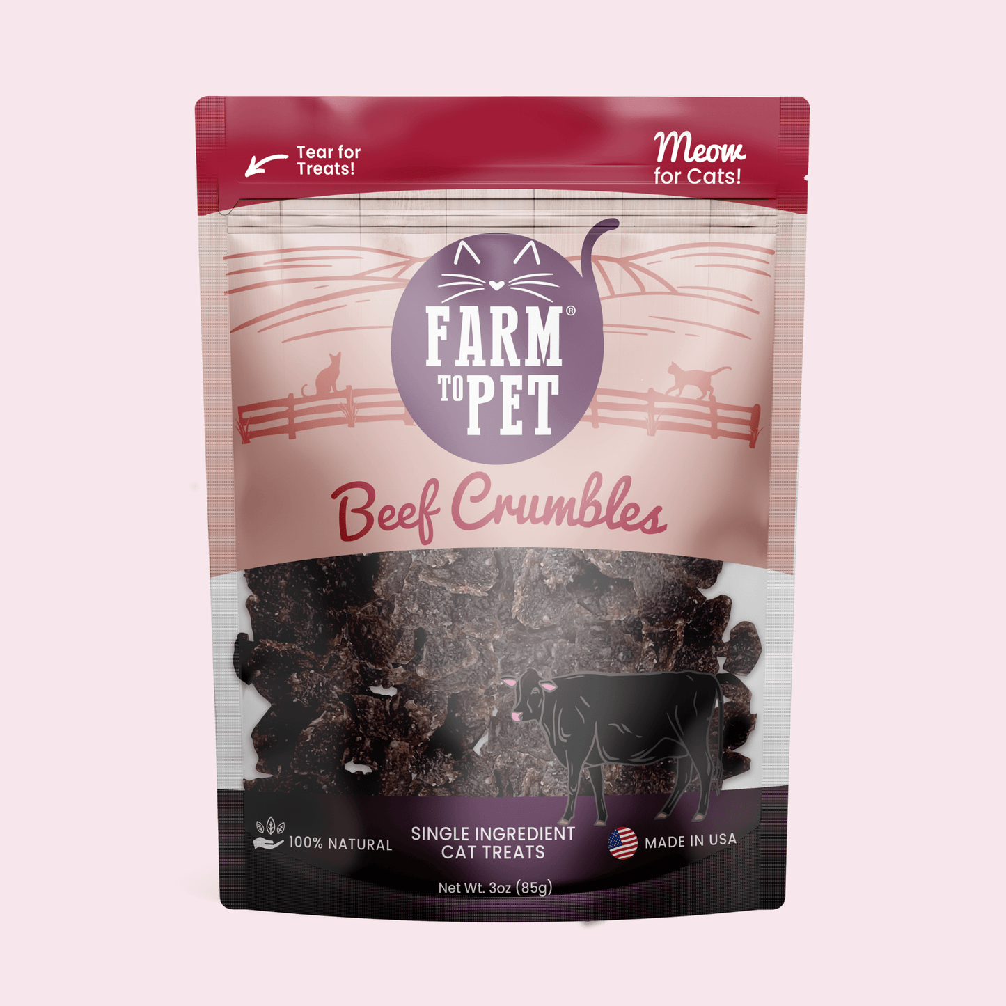 Package of Farm to Pet Beef Crumbles cat treats on a pink background