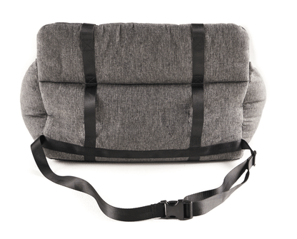 Dog in the performance tweed car bed across a back seat