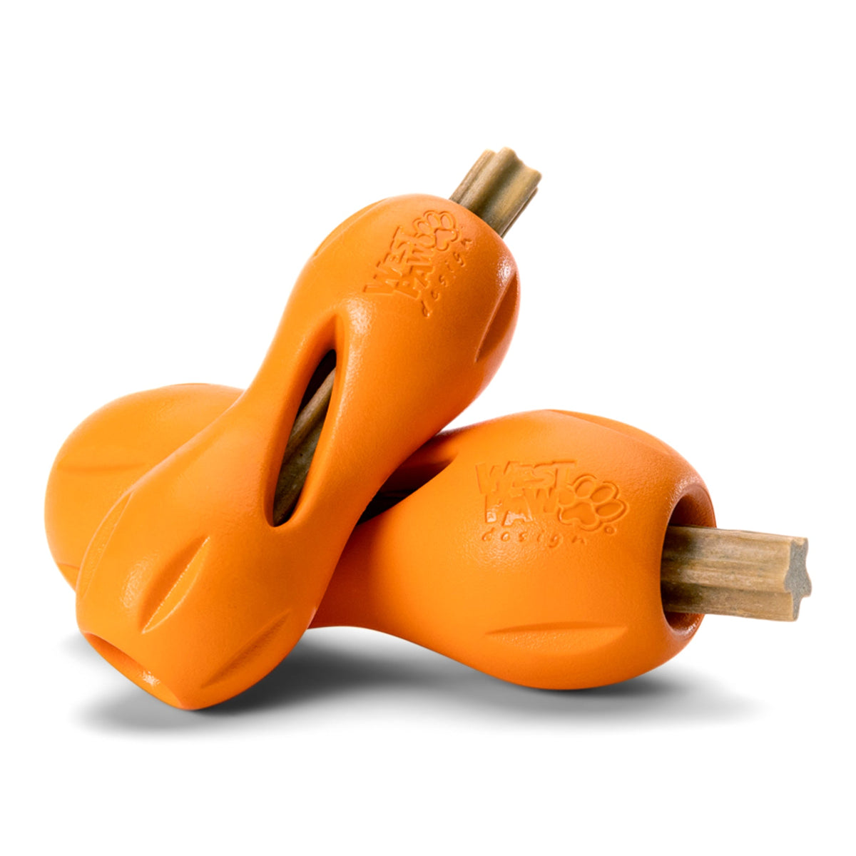 Two orange West Paw Qwizl toys holding natural dental sticks.