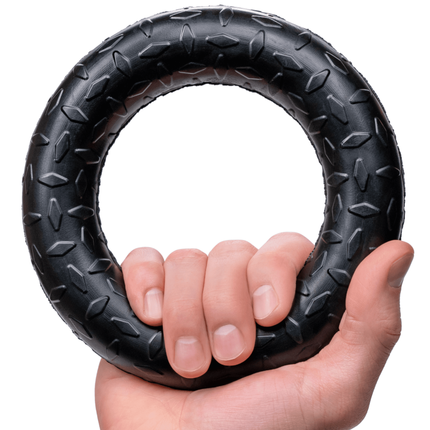 Hand holding a black textured ring against a white background