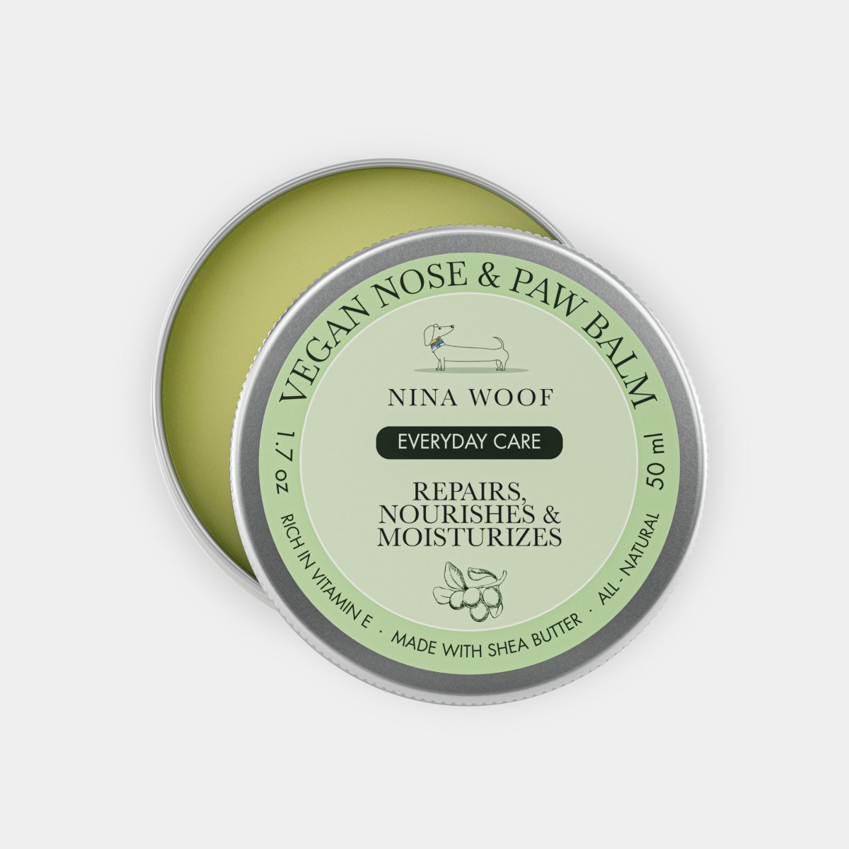 Open tin of Nina Woof Vegan Nose & Paw Balm