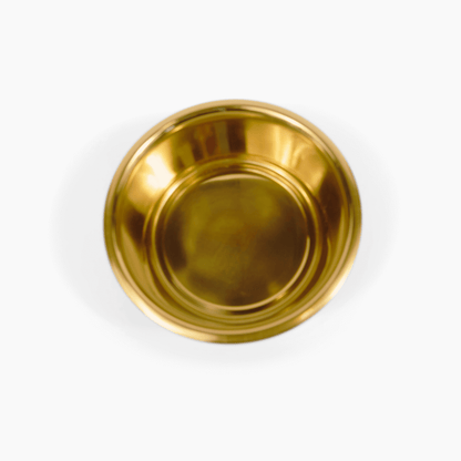 Gold pet bowl viewed from above
